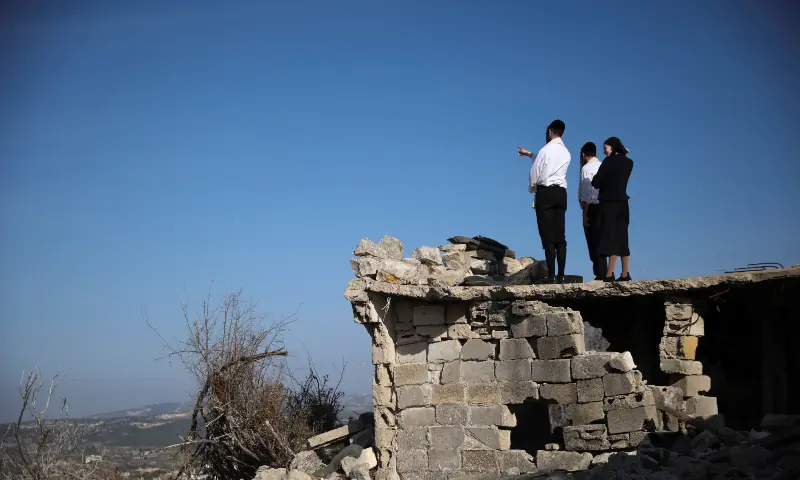 People look towards Lebanon from the Israeli side of the Israel-Lebanon border, in northern Israel on January 8, 2026. — Reuters People look towards Lebanon from the Israeli side of the Israel-Lebanon border, in northern Israel on January 8, 2026. — Reuters