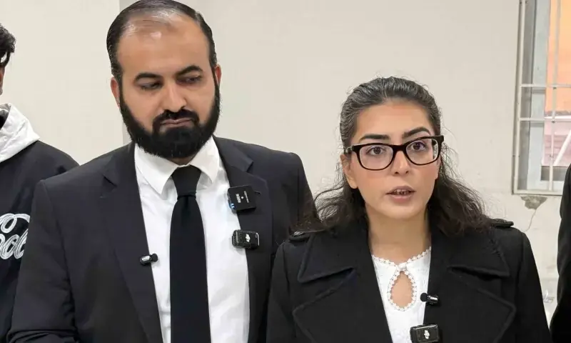 This picture taken on December 5, 2025 shows human rights lawyer Imaan Mazari (R) with her husband and fellow lawyer Hadi Ali Chattha (L), during a court hearing in Islamabad. &mdash; AFP