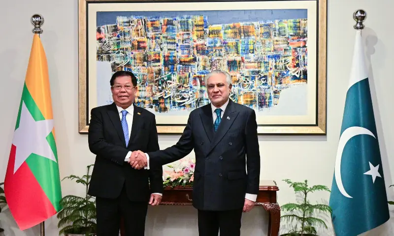 Foreign Minister Ishaq Dar (R) and Myanmar&rsquo;s FM Than Swe (L) shake hands at the Ministry of Foreign Affairs in Islamabad on Jan 26, 2026. &mdash; X/ForeignOfficePk