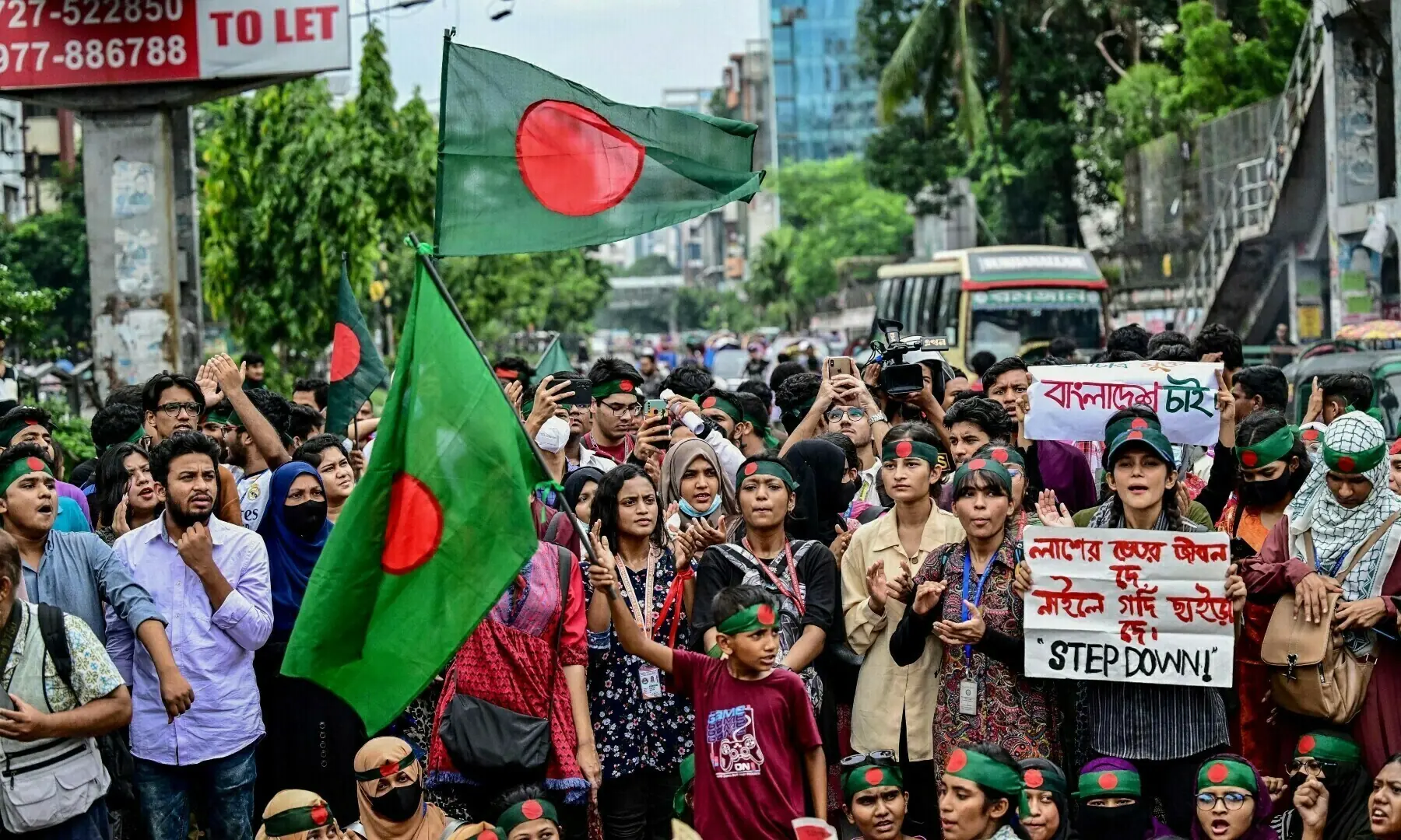 Students shout slogans during a protest march as they demand justice for victims arrested and killed in the recent nationwide violence over job quotas, in Dhaka on Aug 3, 2024. &mdash; AFP/File
