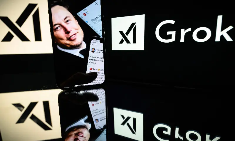 This photograph taken on January 13, 2025, in Toulouse shows screens displaying the logo of Grok, the American company specialising in artificial intelligence and its founder, South African businessman Elon Musk. &mdash; AFP