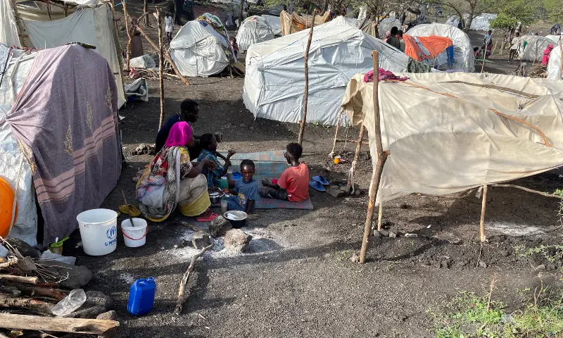 People sit by makeshift shelters near Awlala Camp, Amhara region, Ethiopia on May 31, 2024. &mdash; Reuters