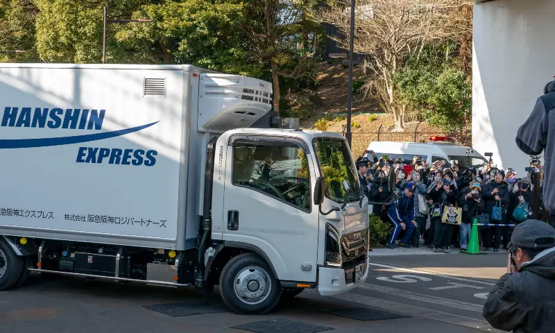 A truck believed to be carrying the twin pandas departs from Ueno Zoo in Tokyo on Jan 27, 2026, heading towards their return to China. &mdash; AFP