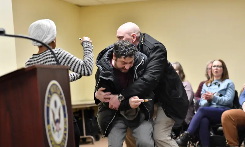 A man is tackled after spraying an unknown substance at US Representative Ilhan Omar (D-MN) (L) during a town hall she was hosting in Minneapolis, Minnesota, on Jan 27, 2026. — AFP A man is tackled after spraying an unknown substance at US Representative Ilhan Omar (D-MN) (L) during a town hall she was hosting in Minneapolis, Minnesota, on Jan 27, 2026. — AFP
