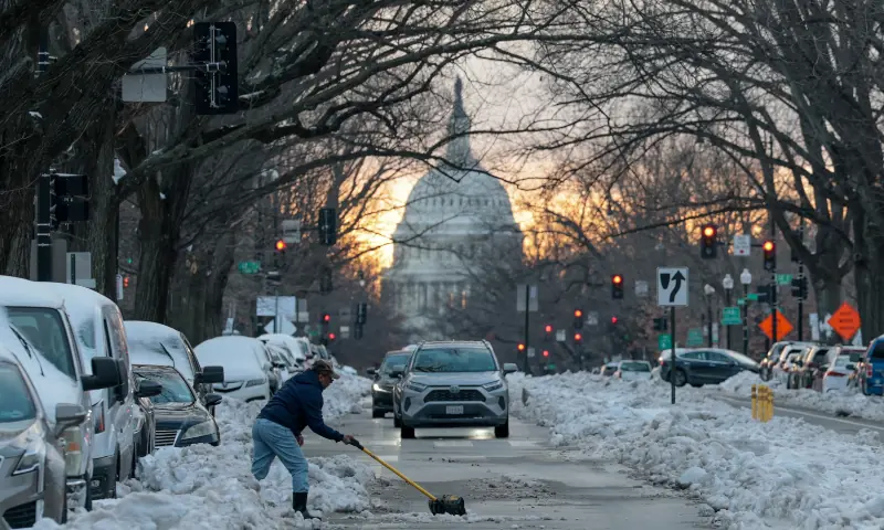 A man shovels snow into the street near the US Capitol as people continue to deal with the aftermath of a major winter storm that dumped snow and ice across a large swath of the United States, in Washington DC, US on January 27, 2026. &mdash; Reuters
