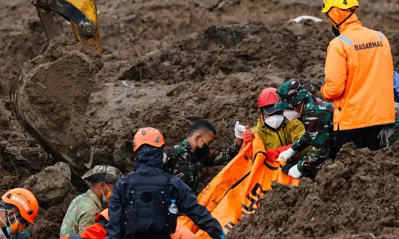 Indonesian rescue members carry a body bag containing the remains of a victim from the site of a landslide following heavy rains in Pasir Langu village, West Bandung regency, West Java province, Indonesia, January 27, 2026. — Reuters Indonesian rescue members carry a body bag containing the remains of a victim from the site of a landslide following heavy rains in Pasir Langu village, West Bandung regency, West Java province, Indonesia, January 27, 2026. — Reuters