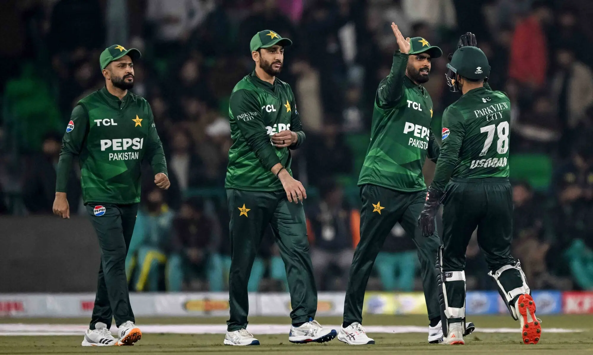 Pakistan&rsquo;s players celebrate after the dismissal of Australia&rsquo;s Cooper Connolly during the first Twenty20 international cricket match between Pakistan and Australia at the Gaddafi Stadium in Lahore on January 29, 2026. (Photo by Arif ALI / AFP)