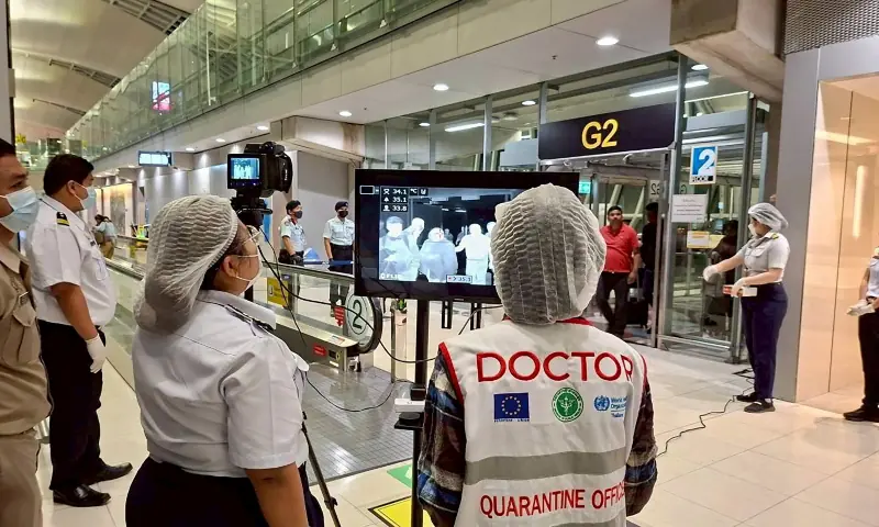 Airport health authorities wearing protective masks monitor passengers from international flights arriving at Suvarnabhumi International Airport in Bangkok, Thailand, January 25, 2026, following the implementation of health screening measures for passengers arriving from West Bengal, India, amid reports of a Nipah virus outbreak. &mdash; Reuters