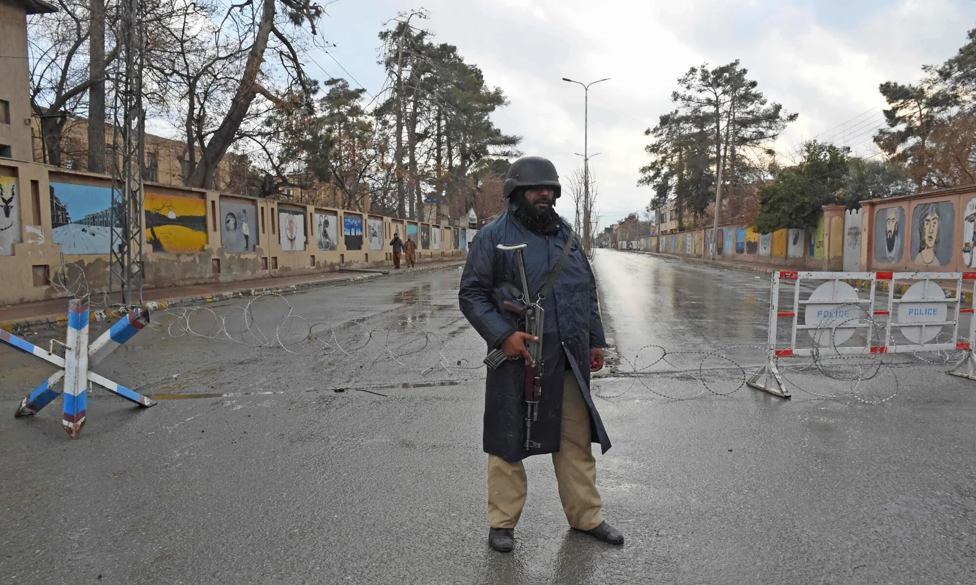 A policeman stands guard near the site of a blast in Quetta on January 31, 2026. — AFP A policeman stands guard near the site of a blast in Quetta on January 31, 2026. — AFP