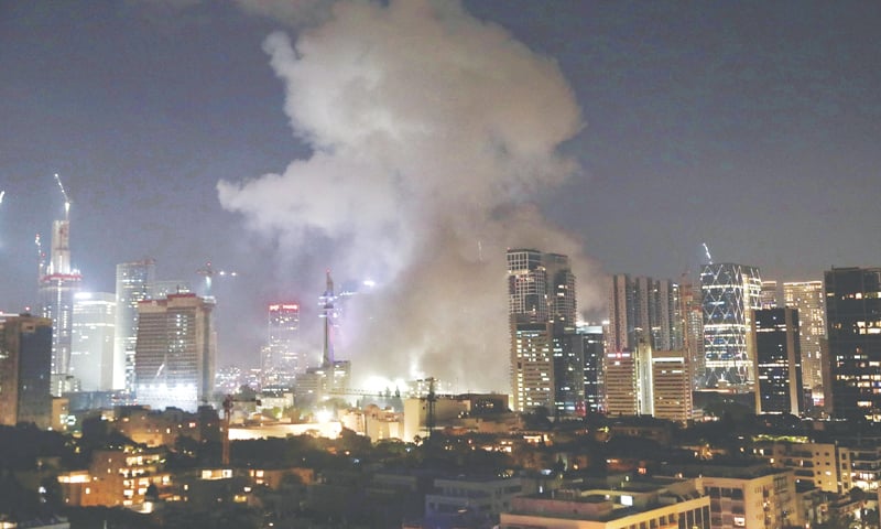 SMOKE billows from downtown Tel Aviv after an Iranian missile strike during the June war. — Dawn archive SMOKE billows from downtown Tel Aviv after an Iranian missile strike during the June war. — Dawn archive