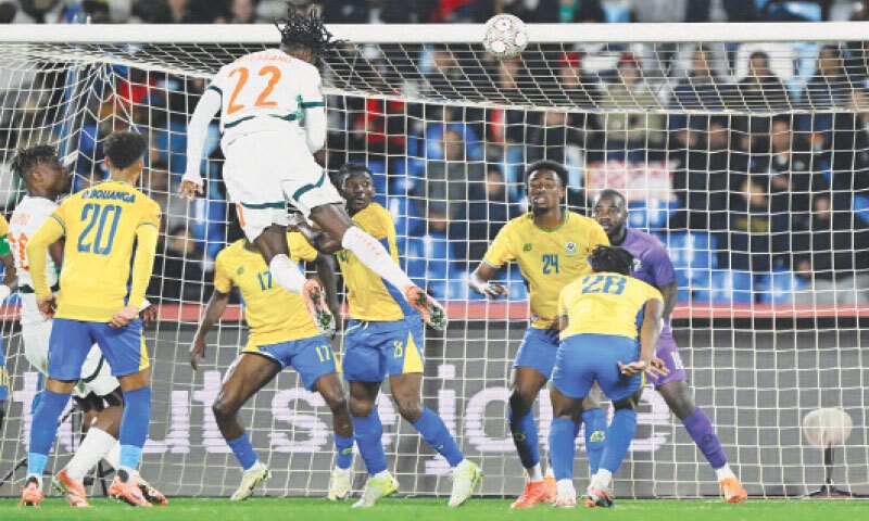 MARRAKECH: Ivory Coast’s Evann Guessand (top) heads to score against Gabon during their Africa Cup of Nations Group ‘F’ match at the Grand Stadium.—AFP MARRAKECH: Ivory Coast’s Evann Guessand (top) heads to score against Gabon during their Africa Cup of Nations Group ‘F’ match at the Grand Stadium.—AFP