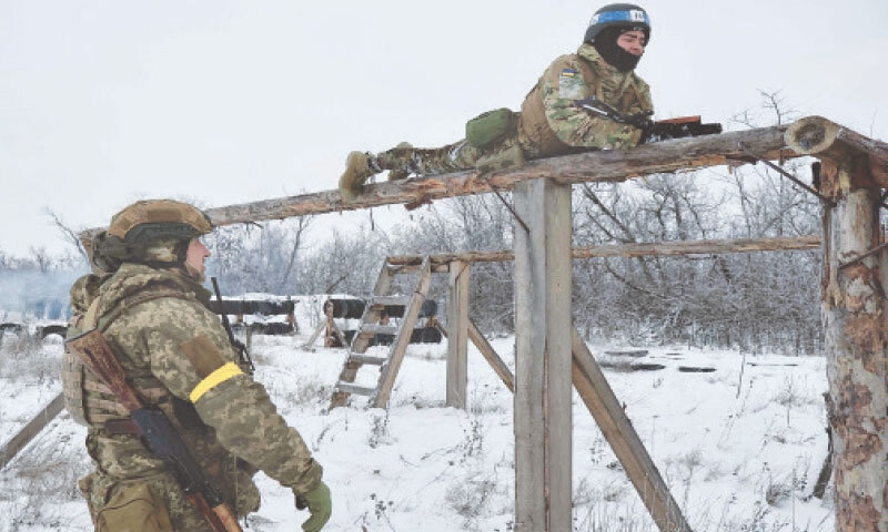 Tetiana, a 20-year-old recruit, takes part in military training in Ukraine&rsquo;s Zaporizhzhia region.&mdash;AFP