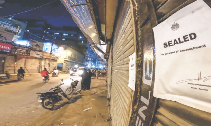 An official notice pasted on a shop on Akbar Road indicates that the outlet in the famous motorcycle market has been sealed by municipal authorities for violating encroachment laws. &mdash;Fahim Siddiqi / White Star