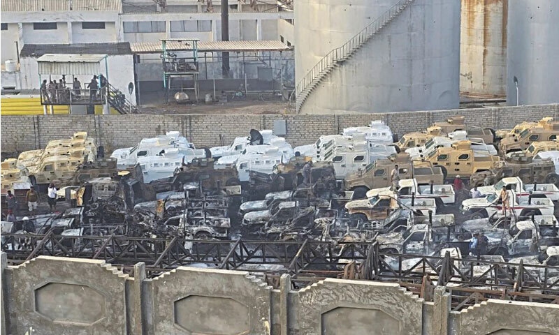Damaged UAE military vehicles following a Saudi-led air strike in the port city of Mukalla in Yemen's south on December 30, 2025 | AFP