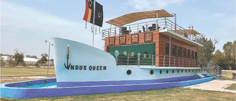 A replica of Indus Queen on the lawns of Noor Mahal.
