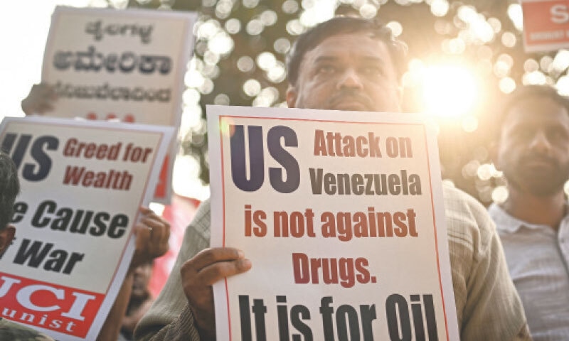 Bengaluru: A socialist activist takes part in a protest against the US attack on Venezuela.&mdash;AFP