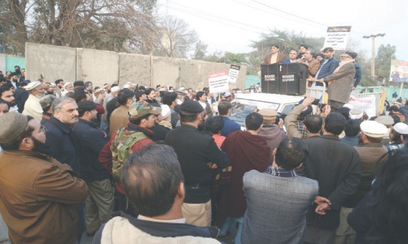 Local government representatives block Khyber Road, Peshawar, on Monday. &mdash; White Star