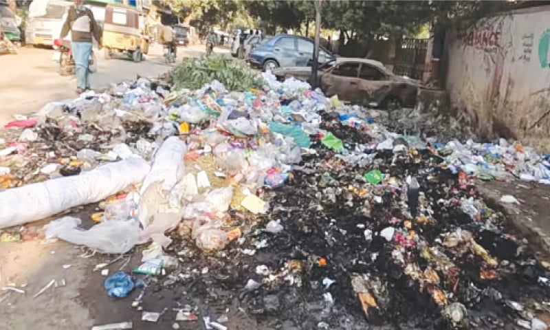 Black ash is left after a pile of garbage was partially burned in a Nazimabad locality. The open burning of garbage creates significant air pollution and poses serious health hazards for humans. —Fahim Siddiqi / White Star Black ash is left after a pile of garbage was partially burned in a Nazimabad locality. The open burning of garbage creates significant air pollution and poses serious health hazards for humans. —Fahim Siddiqi / White Star