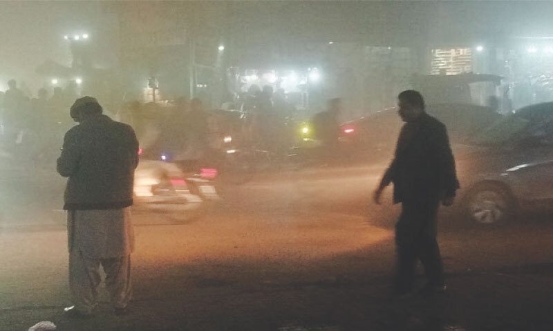 VISIBILITY dropped significantly following a severe cold wave on Thursday in Larkana.&mdash;Dawn