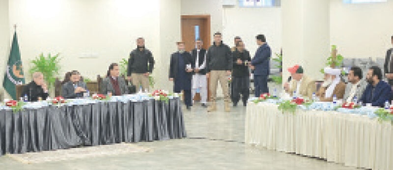 FLANKED by CM Sarfraz Bugti, PM Shehbaz Sharif listens as National Party chief Dr Abdul Malik Baloch speaks during a meeting between federal government functionaries and political leaders from Balochistan.—Courtesy PID