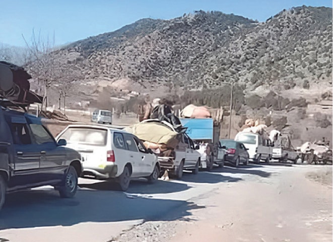  Vehicles carrying displaced families line up outside a registration centre near Bara, Khyber tribal district. &mdash; Dawn 