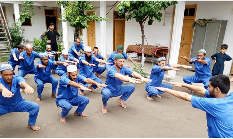 Drug addicts participate in physical activity at a rehabilitation centre in Balambat, Lower Dir. &mdash; Photo by Haleem Asad