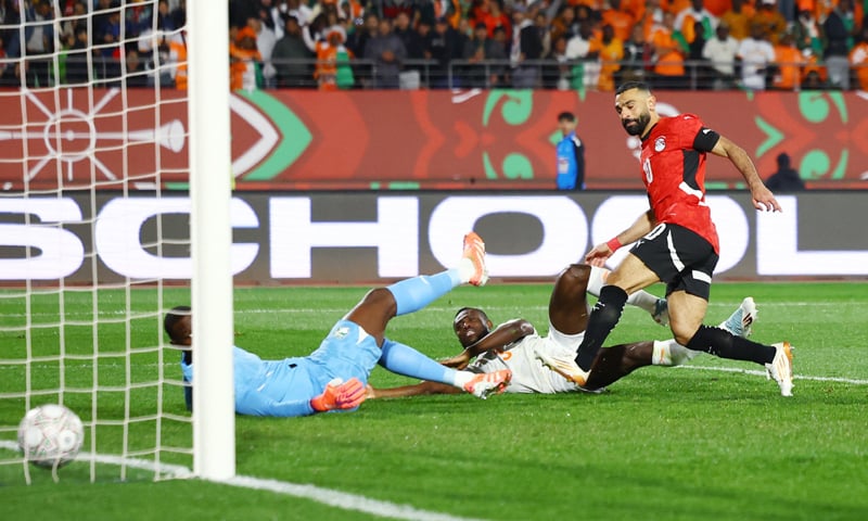 AGADIR: Egypt&rsquo;s Mohamed Salah scores during the Africa Cup of Nations quarter-final against Ivory Coast at Adrar Stadium.&mdash;Reuters