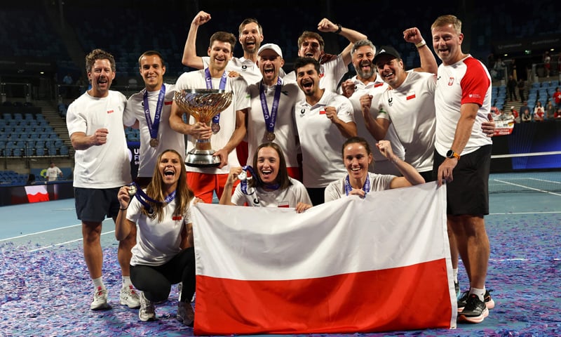 SYDNEY: Poland players pose with the trophy after defeating Switzerland in the United Cup final on Sunday.&mdash;AFP