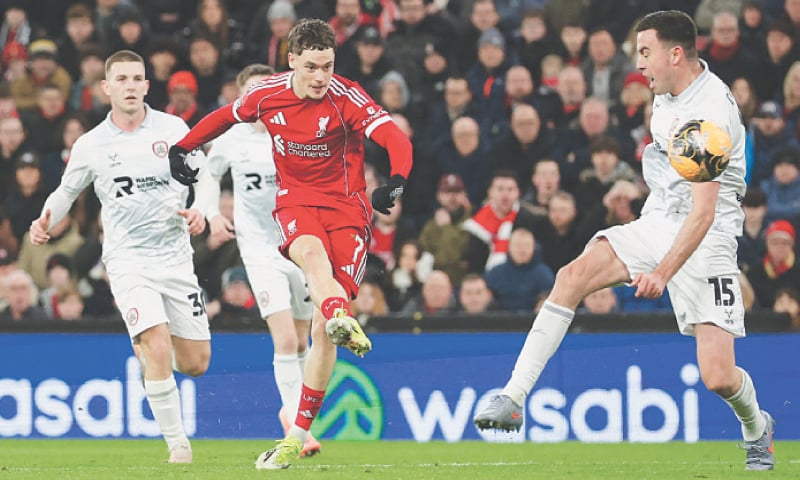 LIVERPOOL: Florian Wirtz (second R) of Liverpool scores against Barnsley during their FA Cup third-round match at Anfield.&mdash;Reuters