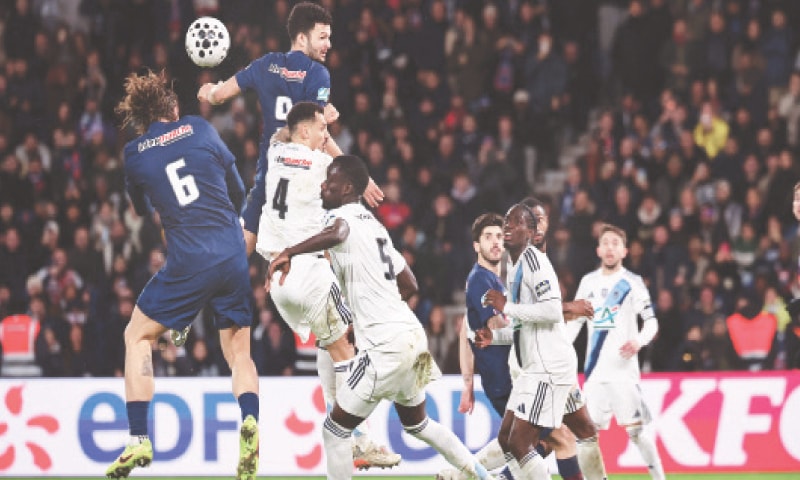 PARIS St-Germain’s Goncalo Ramos (top) vies for the ball with Timothee Kolodziejczak of Paris FC during their French Cup round-of-32 match at the Parc des Princes Stadium.—AFP PARIS St-Germain’s Goncalo Ramos (top) vies for the ball with Timothee Kolodziejczak of Paris FC during their French Cup round-of-32 match at the Parc des Princes Stadium.—AFP