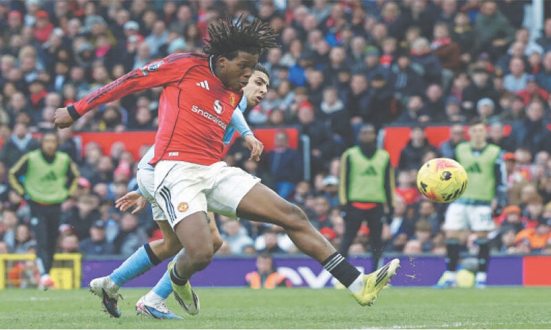 MANCHESTER: Patrick Dorgu of Manchester United shoots to score during the Premier League match against Manchester City at 
Old Trafford on Saturday.&mdash;AFP