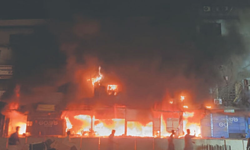 A massive fire has engulfed shops in Gul Plaza on M.A. Jinnah Road, sending flames and thick smoke into the sky. &mdash;Fahim Siddiqi / White Star