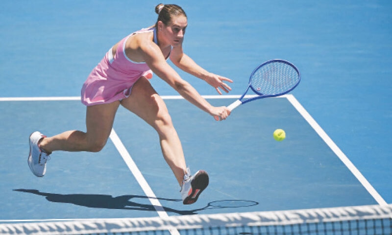 Ukraine&rsquo;s Marta Kostyuk hits a return against Elsa Jacquemot of France during their Australian Open match on Sunday.&mdash;AFP