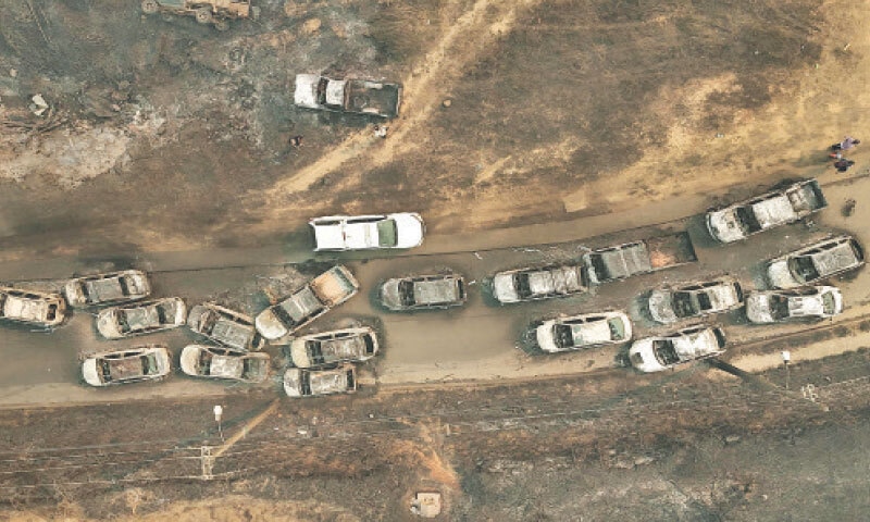 An aerial view of the remains of burned vehicles after a wildfire in Concepcion.—AFP An aerial view of the remains of burned vehicles after a wildfire in Concepcion.—AFP