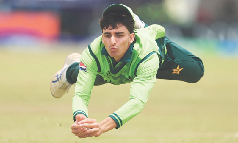 PAKISTAN&rsquo;S Ahmed Hussain takes a catch to dismiss Scotland&rsquo;s Manu Saraswat during their U-19 World Cup match at the Takashinga Sports Club on Monday.&mdash;Courtesy ICC