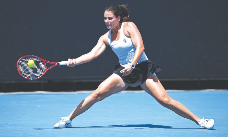 MELBOURNE: Emma Navarro of the US in action during her Australian Open first-round match against Poland’s Magda Linette at Melbourne Park on Monday.—Reuters MELBOURNE: Emma Navarro of the US in action during her Australian Open first-round match against Poland’s Magda Linette at Melbourne Park on Monday.—Reuters