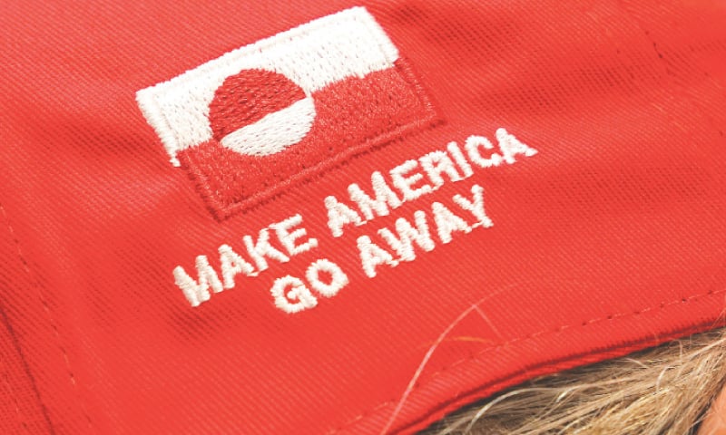 THE owner of a clothing store in Copenhagen shows a cap carrying the slogan &ldquo;Make America Go Away&rdquo;.&mdash;Reuters