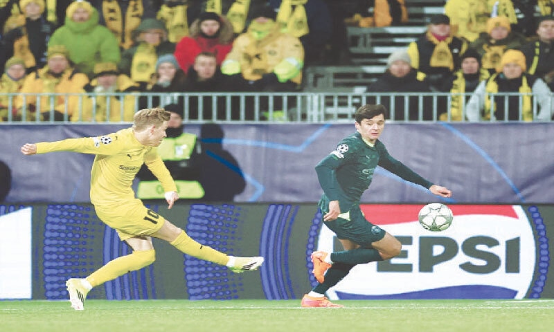 BODO: Bodo/Glimt&rsquo;s Jens Hauge (L) scores during the match against Manchester City at Aspmyra Stadion.&mdash;Reuters