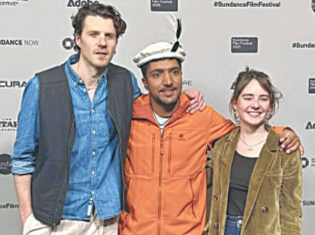 Sajid Ali Sadpara poses with producers Sean Richard (L) and Olive Faure at the Sundance premiere.&mdash;Dawn