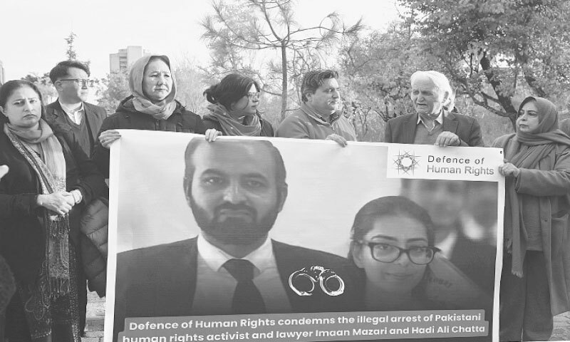 MEMBERS of civil society protest against the arrest of Imaan Mazari-Hazir and her husband, Advocate Hadi Ali Chattha, outside the National Press Club.&mdash;Tanveer Shehzad