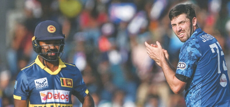 England&rsquo;s Jamie Overton celebrates after dismissing Sri Lankan batter Janith Liyanage during the second One-day International at the R. Premadasa International Stadium on Saturday.&mdash;AFP