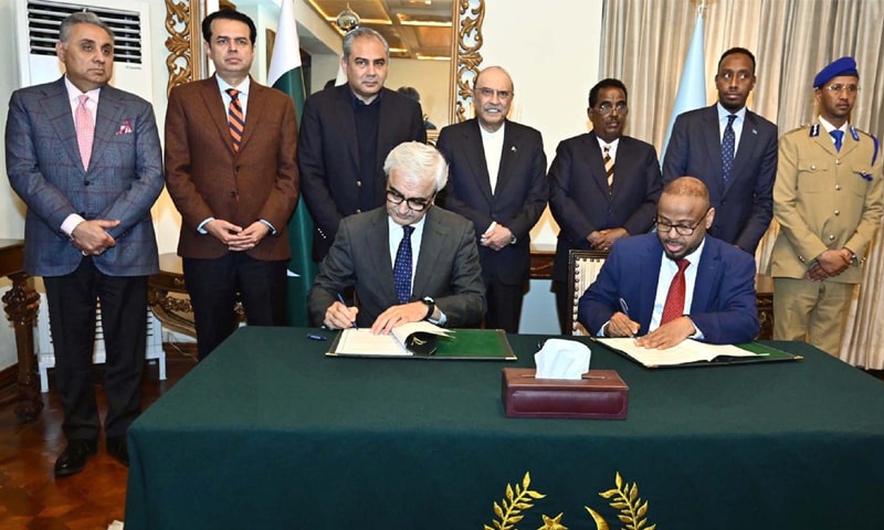 PRESIDENT Asif Ali Zardari, Somali Interior Minister Ali Yousuf, Interior Minister Mohsin Naqvi and State Minister for Interior Talal Chaudhry witness the signing of an agreement at the Aiwan-i-Sadr on Saturday.&mdash;PPI