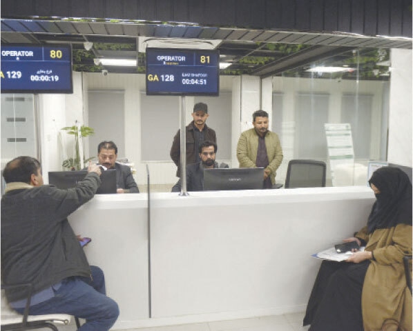 MCI staff attend to visitors at the PAKC building. People can get birth and death certificates at the facility.