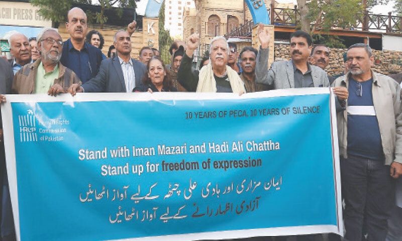 MEMBERS of civil society hold a protest against the arrest of activists Imaan Mazari-Hazir and her spouse Hadi Ali Chattha at the Karachi Press Club on Monday.—PPI MEMBERS of civil society hold a protest against the arrest of activists Imaan Mazari-Hazir and her spouse Hadi Ali Chattha at the Karachi Press Club on Monday.—PPI