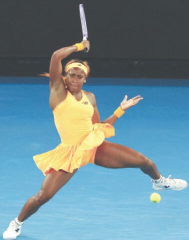 COCO Gauff of the US hits a return during the Australian Open quarter-final against Ukraine’s Elina Svitolina at the Melbourne Park on Tuesday.—AFP