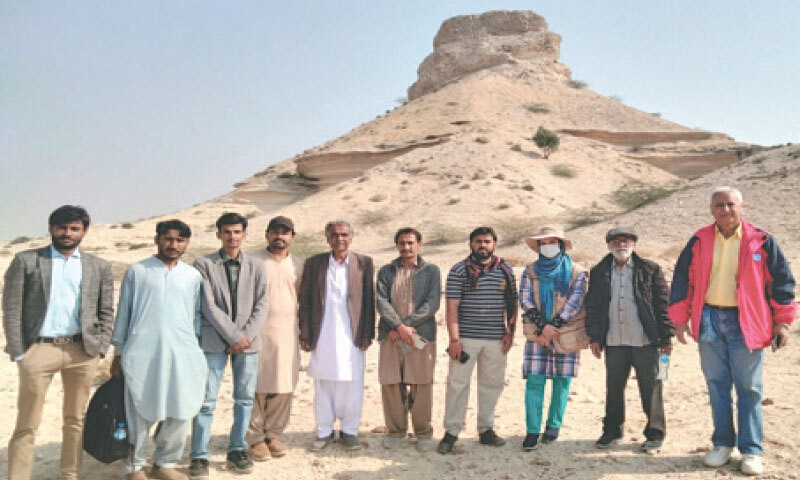 THE archaeology experts in a group photo with officials at Rohri Hills.&mdash;Dawn