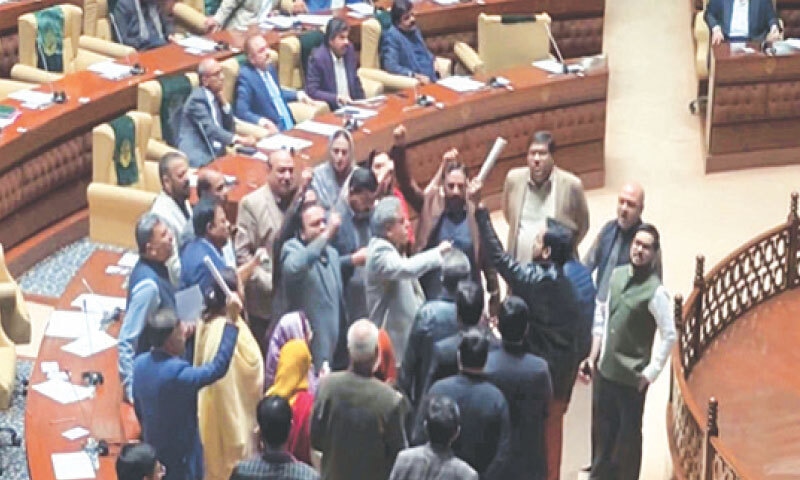 Opposition lawmakers stage a protest during the Sindh Assembly session, demanding a judicial committee to investigate the Gul Plaza fire.&mdash;PPI