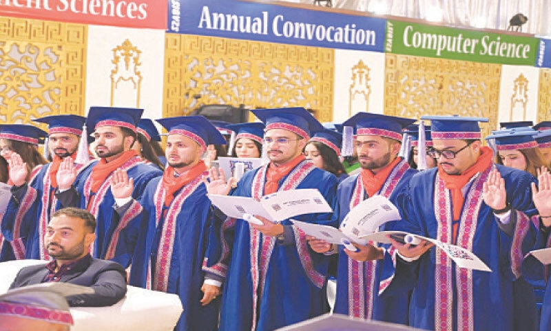 Graduates taking oath at the convocation.—Dawn Graduates taking oath at the convocation.—Dawn