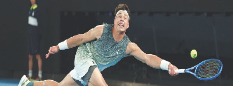 BEN Shelton of the US reaches for a return during the Australian Open semi-final against Italy’s Jannik Sinner at the Melbourne Park on Wednesday.—Reuters