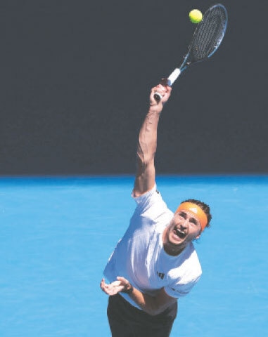 GERMANY’S Alexander Zverev serves to Carlos Alcaraz of Spain during their semi-final.—AFP